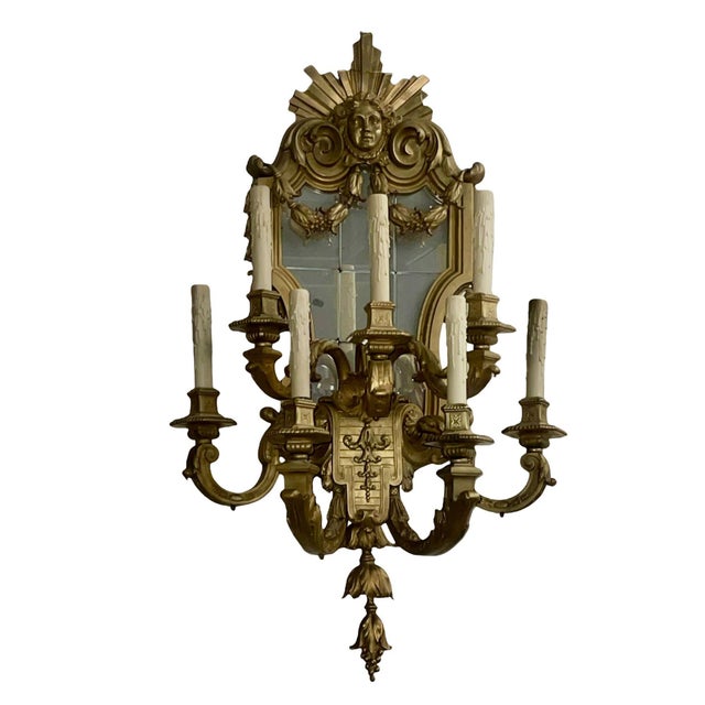 Impressive and highly decorative pair of late 19th century French gilt bronze wall sconces, executed in the Regency taste...