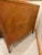 Beautiful vintage wooden cabinet with a warm, rich wood finish and classic mid-century styling. Features two paneled...