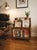 This exceptional vintage floor caddy from the renowned Leick Furniture Company of Sheboygan, Wisconsin, offers a highly...