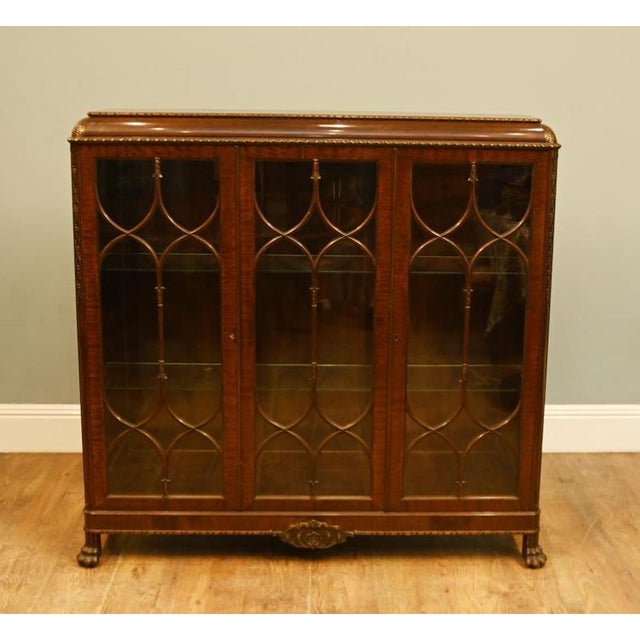 Handsome Chippendale style mahogany glazed bookcase or display cabinet, dating to the early 20th century, circa 1900-1920...