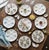 An extraordinary, decorator-grade complete set of eight (8) late 19th-century French fine porcelain oyster plates,...
