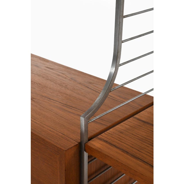 Wood Large Bookcase in Teak and Chromed Steel attributed to Nils Strinning, 1960s For Sale - Image 7 of 11