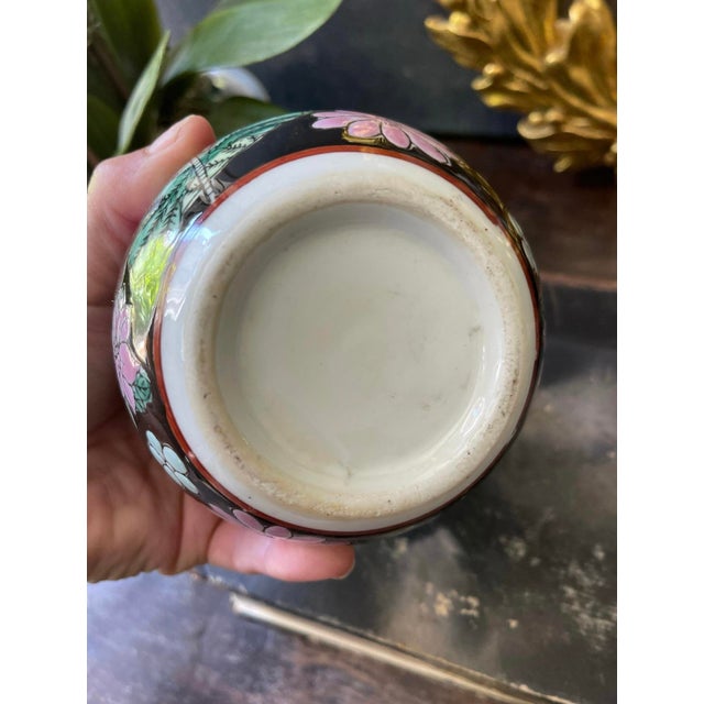 Lovely small ginger jar, measuring 4.5” x 4.5”, this round bodied vessel is lovely in its midnight glossy black glaze with...