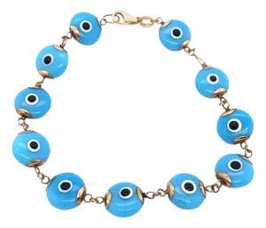 14 Karat Yellow Gold Blue Ceramic Evil Eye Charm Bracelet