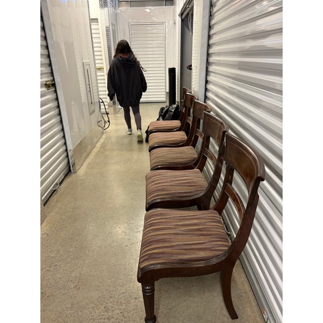 Set of five elegant Empire-style dining chairs, professionally refinished and ready to use. These chairs feature classic...