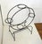 Small plant stand, round with openwork, two large circles (50 cm diameter), supporting 4 pot holders (pot holder diameter...
