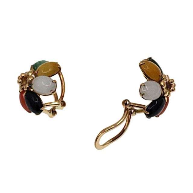 Vintage Multicolor Jade Flower Clip Earrings, circa 1970. These vintage clip-on earrings are crafted in 14 karat yellow...