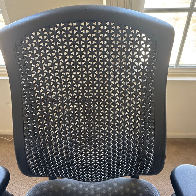 The Herman Miller Celle Chair is a high-performance ergonomic task chair engineered for exceptional comfort,...