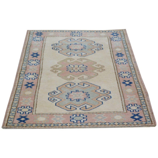 Hand-knotted with care using traditional rug-making techniques, this wool rug blends timeless craftsmanship with a modern...