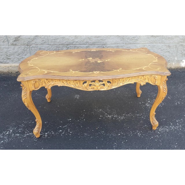 Rococo Revival Marquetry Fruitwood Coffee Table. Measures 31" in width, 20" in depth and 17.25" in height,