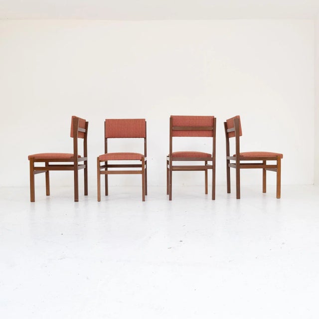 Refined set of four Italian chairs from the 1970s, with solid wood frame and upholstered seat and backrest, covered in...