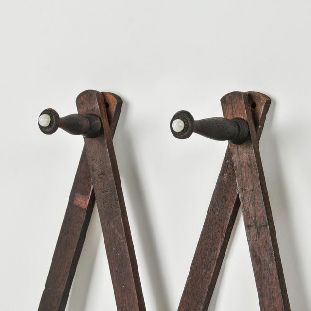 Antique Accordion Peg Holder With Porcelain Caps | Wall Mount Early 1900's Expandable Peg Rack For Sale - Image 11 of 13