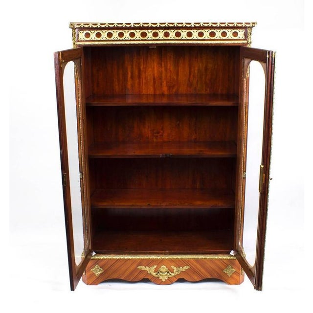 This is a beautiful Victorian burr walnut and tulipwood double door low display cabinet, circa 1860 in date. It has been...