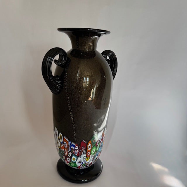 A sculptural hand-blown Murano art glass vase by Gambaro & Poggi, featuring rich bronze-brown glass infused with...