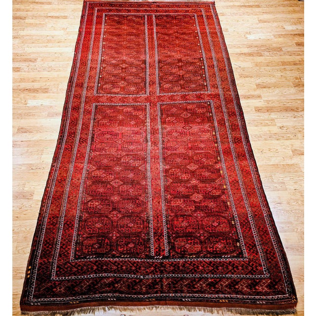 Observe the rich tribal artistry and enduring legacy of this magnificent early 20th century Turkmen Tekke gallery or...