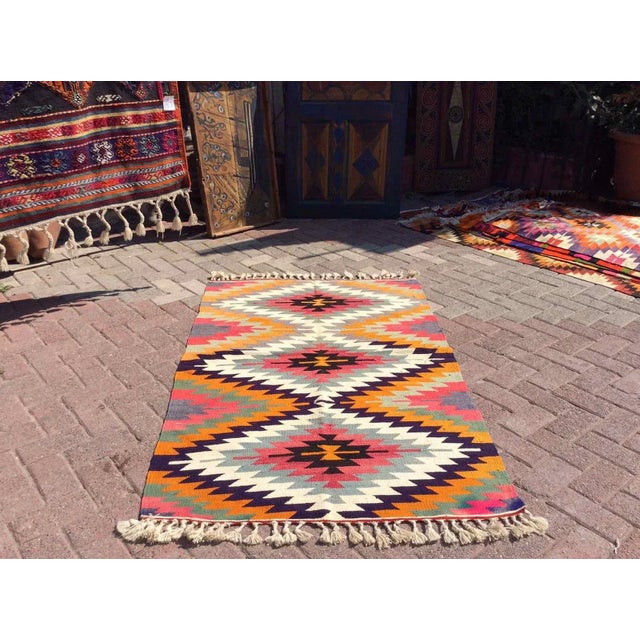 This beautiful, vintage, handwoven Kilim is approximately 60 years old. It is handmade of very fine quality, wool and...