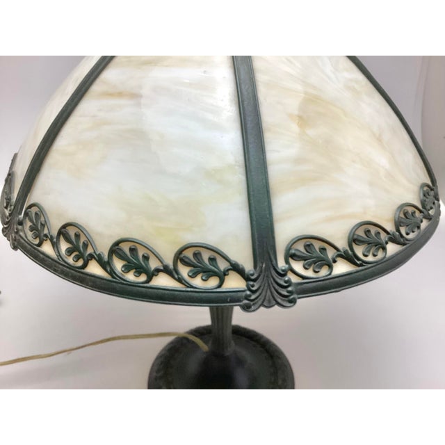 Early 20th Century Slag Glass Lamp Edward Miller & Co. This is a wonderful slag glass lamp measuring 21 1/2 inches tall to...