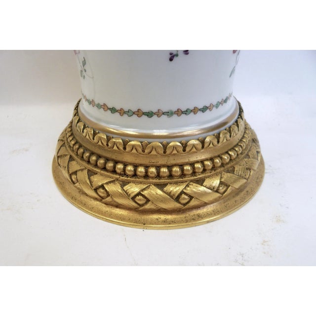 This hand painted porcelain vase, mounted as a lamp in gilt bronze by Edward F. Caldwell is newly re-wired, and ready for...
