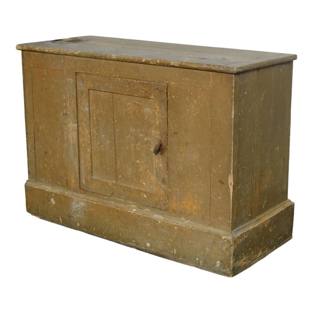 Vintage wood cabinet from France with shelves inside and painted a dark olive green. Matching piece listed.