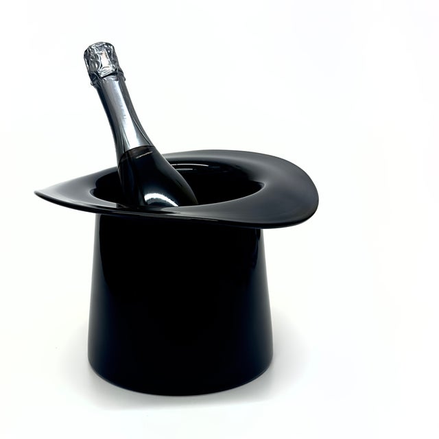 Glass top-hat ice bucket. This is a stunning black top-hat-shaped 1970s Murano-style glass ice bucket. A unique feature to...