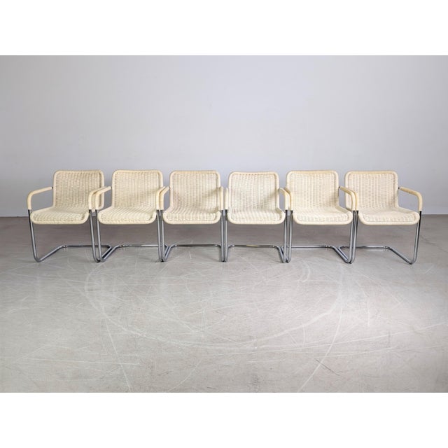 We are offering a beautiful set of six Tecta armchairs for sale. The chairs are upholstered in light-colored wicker and...