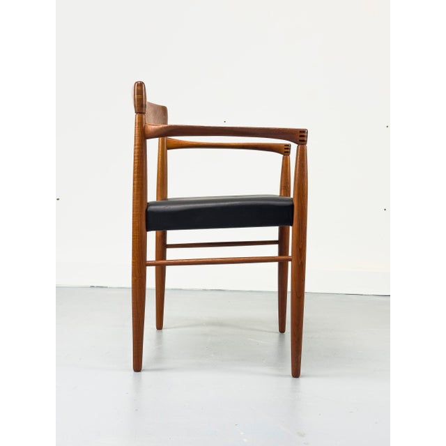 High-quality and very comfortable armchair made of solid teak with beautifully shaped armrests and exquisite details,...