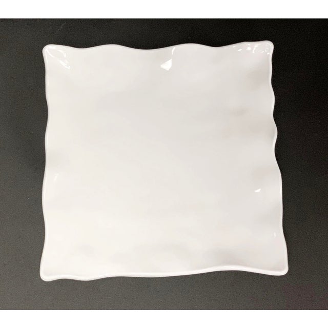 White melamine platter with a ruffled rim. Made by Q Squared NYC. This was used in the Waldorf Astoria, NYC. Priced each....