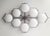 Italian midcentury flush mount with eight glossy white Murano glass shades mounted on solid brass frame in bronze finish /...