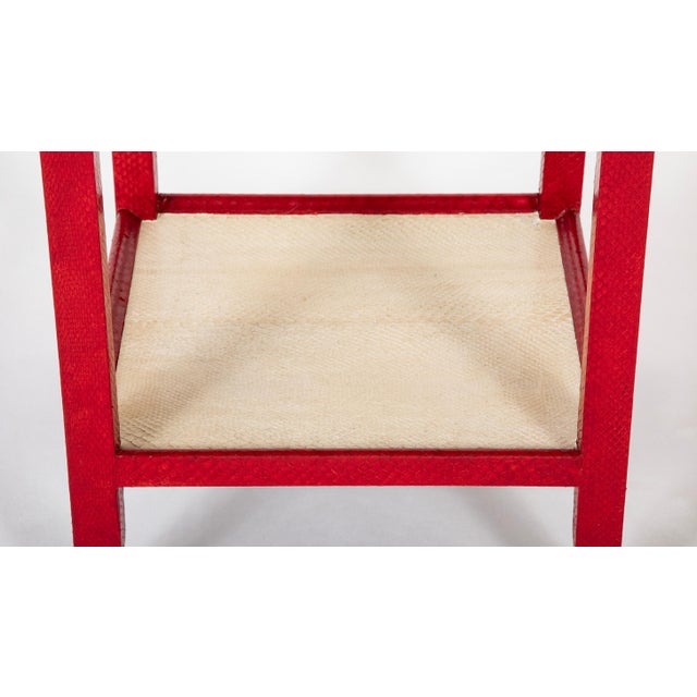 Karl Springer style telephone table, drinks table, wrapped in authentic red and white dyed cobra skin. Supported by four...