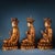This elegant set of three gilt bronze figures depicts seated Bodhisattvas, each seated in a meditative lotus position upon...