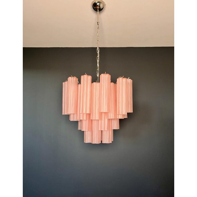 Italian vintage chandelier in Murano glass and nickel-plated metal structure. The armor polished nickel supports 36 large...