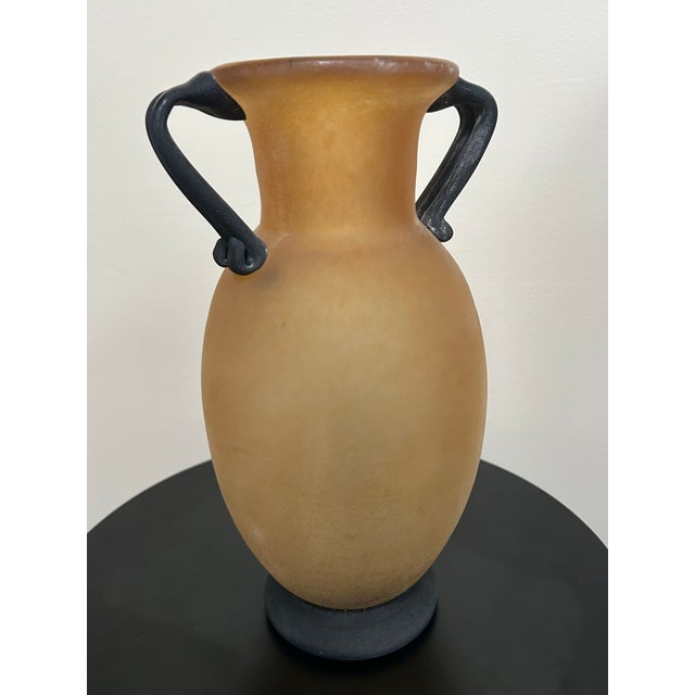 Late 20th century Murano glass amphora vase executed in a warm frosted amber scavo finish with contrasting black applied...