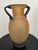 Late 20th century Murano glass amphora vase executed in a warm frosted amber scavo finish with contrasting black applied...