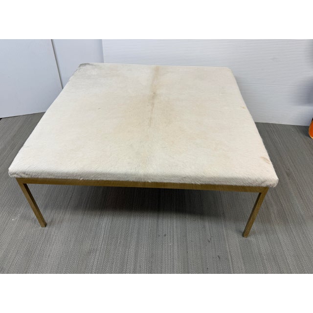 Design Plus Gallery presents a Modern Square Cowhide Ottoman on Brass Frame. The square silhouette is upholstered in...