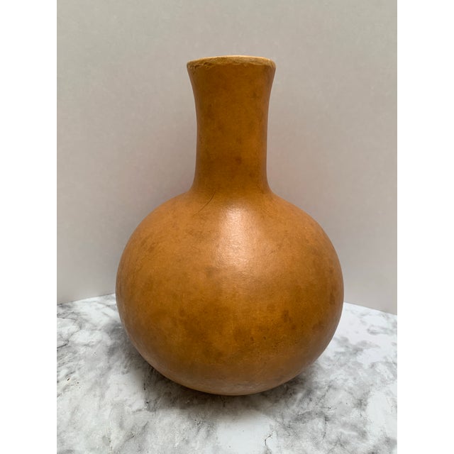 Sweet earthy handcrafted vintage gourd vessel or vase with etched flowers in a soft amber tone. Perfect with dried flowers...