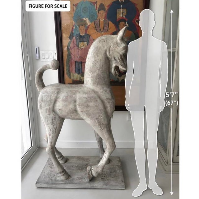 Fabulous monumental vintage carved wood horse featuring a gracefully arched neck, dramatic curled tail, and raised hoof....