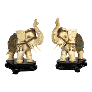 Mid 20th Century Carved Bone Elephant Sculptures, a Pair