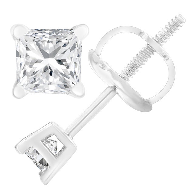 Elegant and classic, these solitaire studs are beautifully set in the finest 18k white gold and shine with a natural,...
