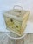 This charming item is a vintage metal tole tea or biscuit box, hand-painted and likely European or Italian in style....