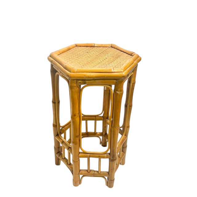 Classic piece works in any decor. Hexagonal nice chunky bamboo plat stand or table.