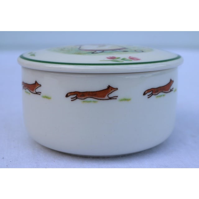 Charming fine porcelain Villeroy and Bosch Foxwood Tales box. This round box features an adorable rabbit golfing. I love...