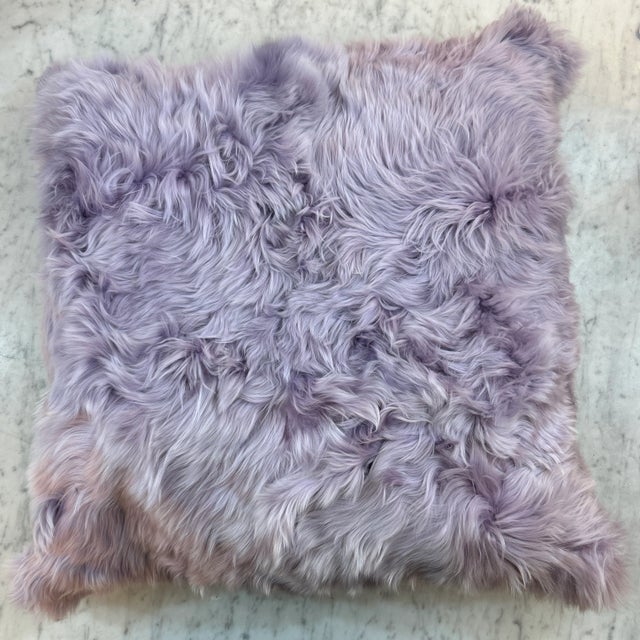 Gorgeous alpaca fleece pillow in a beautiful fluffy pale purple/ violet/ lavender color. It is fury and soft and cozy and...