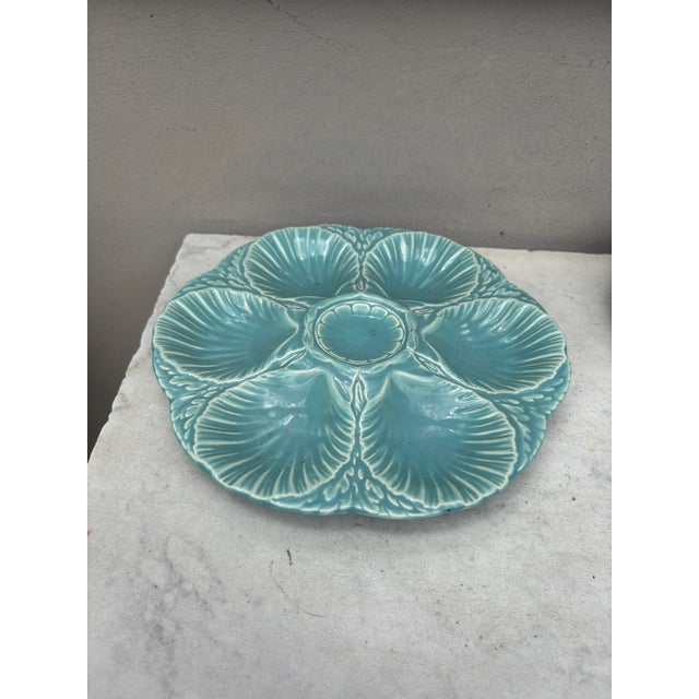 French aqua turquoise Majolica oyster plate signed Sarreguemines Majolica, circa 1900. 6 shells and space for the lemon on...