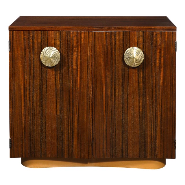 Art Deco Brass Pulls & Leather Wrapped Base Paldao Wood Cabinet by Gilbert Rohde For Sale