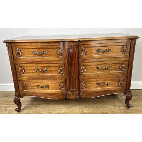 A beautifully shaped Vintage French Louis chest of drawers , showcasing elegant curves, refined craftsmanship, and rich...