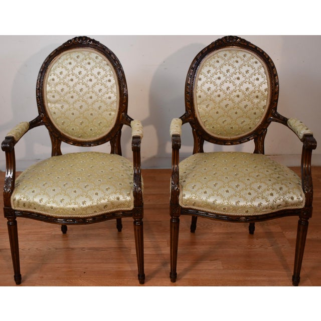 We are Pleased to offer this Beautiful set of six French Louis XV dining room chairs, from the 1930s. This set of 2 arm...