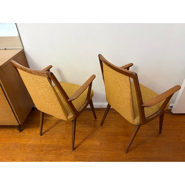 Set of Vintage Mid-Century Modern all original captain side chairs in pristine condition.