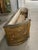 Beautiful French jardiniere in plaster and wood with bows and garland, 19th century. Antique gold finish. No decoration on...