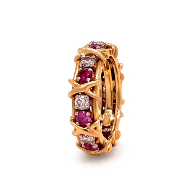 A timeless Tiffany & Co. Schlumberger Sixteen Stone ring in platinum, featuring the Maison’s iconic cross-stitch inspired...
