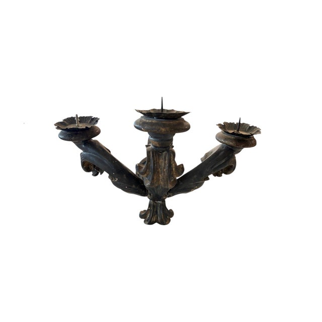 A rare pair of 17th century Italian sconces from Lucca, beautifully hand-carved with a richly aged patina that reflects...